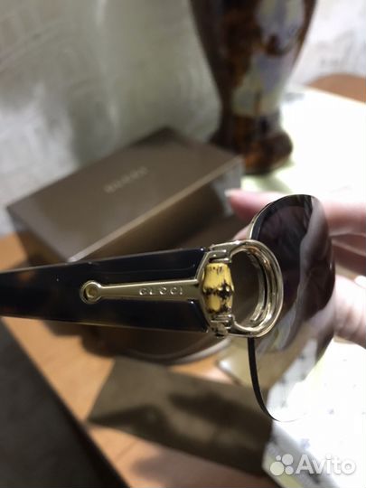 Солнцезащитные очки Gucci