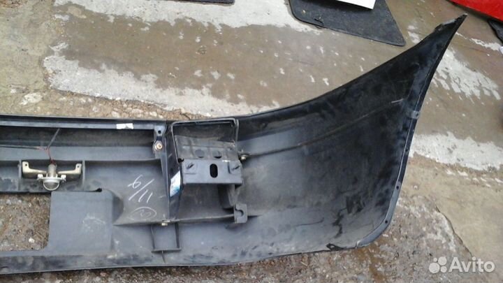 Бампер Mazda 323F 1