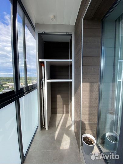 Шкаф с рольставнями на балкон на заказ