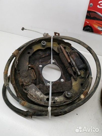 Щит опорный задний левый (Mitsubishi Galant)