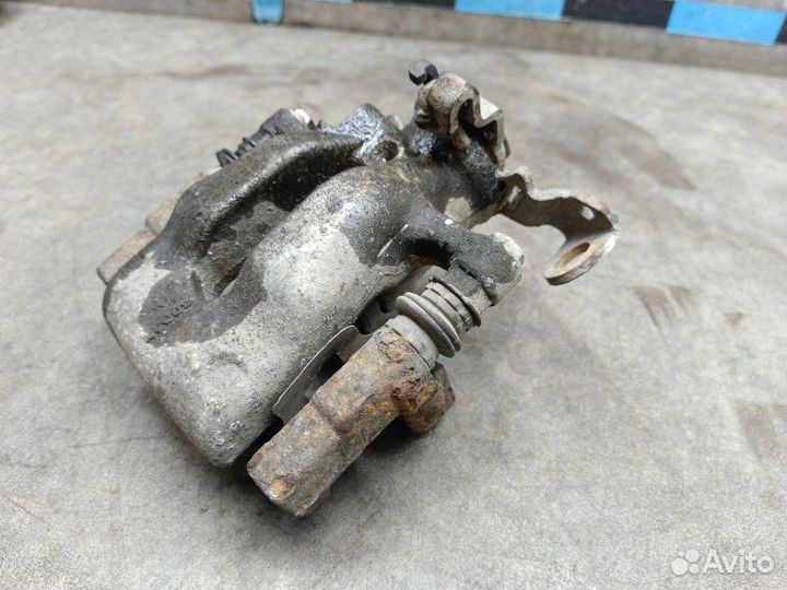 Суппорт задний левый Opel Astra H (3D) 1.6 Z16XER