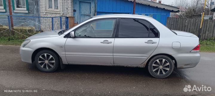 Mitsubishi Lancer 1.5 CVT, 2004, 200 000 км