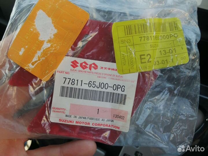 Эмблема suzuki