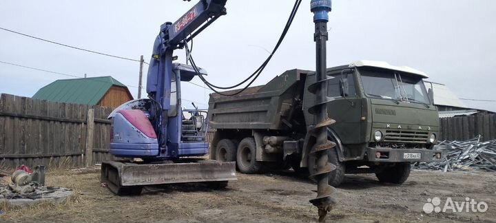 Услуги ямобура бурение Экскаватор