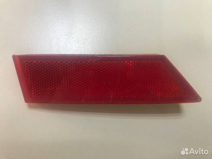 Светоотражатель в задний бампер левый