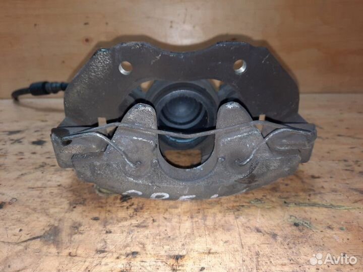 Суппорт передний левый Mazda Premacy crew lfde