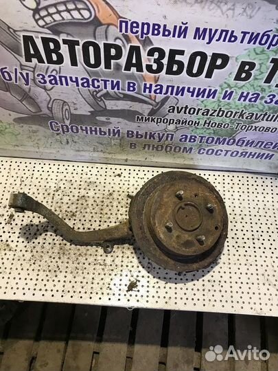 Кулак задний левый Kia Optima