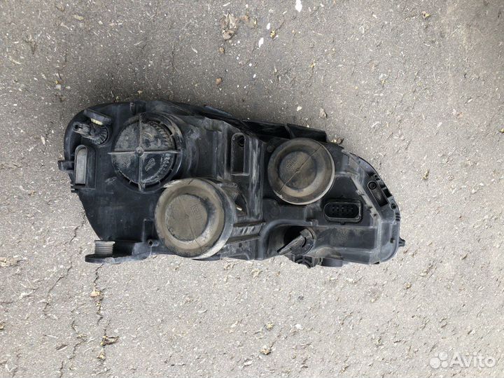 Фара левая Passat B7