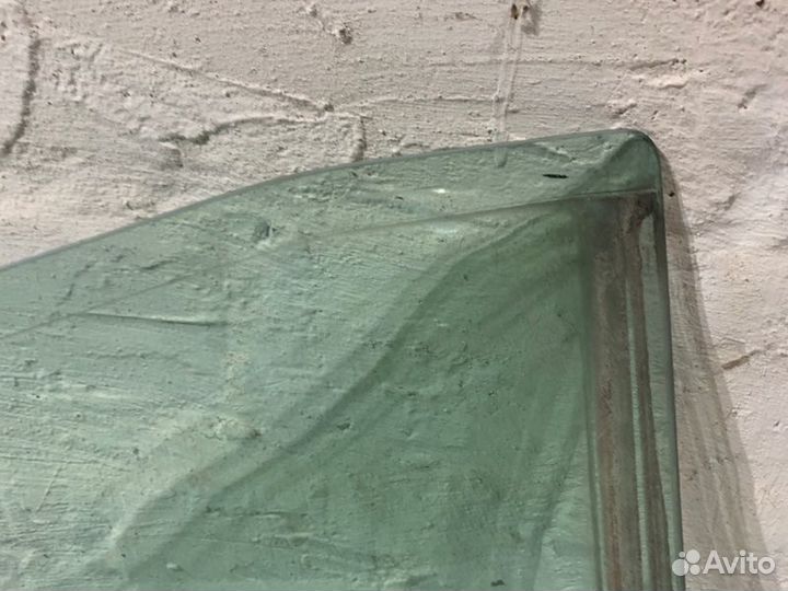 Стекло двери задней левой (форточка) Renault