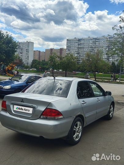 Mitsubishi Lancer 1.6 AT, 2005, 310 000 км