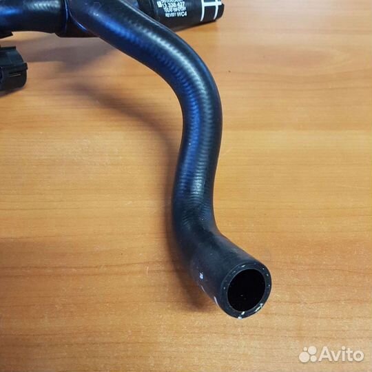 Патрубок отопителя выпускной Opel Astra J 1.6