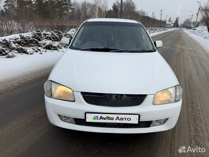 Mazda Familia 1.3 AT, 1999, 329 000 км
