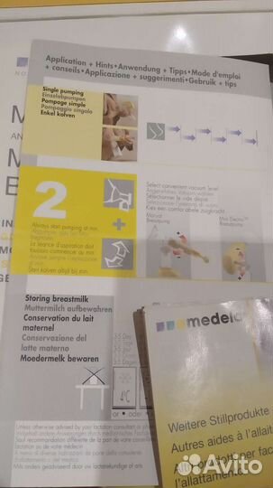 Молокоотсос medela электрический