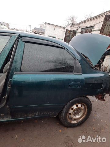 Задняя левая дверь kia sephia 2