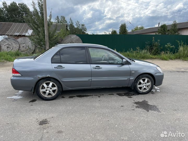Mitsubishi Lancer 1.6 МТ, 2004, 338 515 км