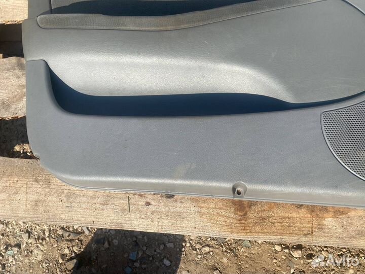 Обшивка двери передняя левая Chevrolet Lacetti