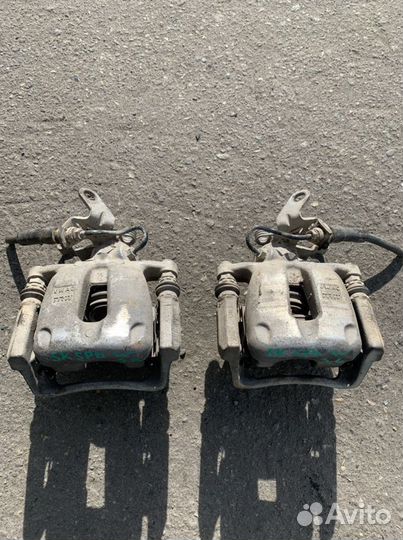 Суппорт тормозной задний Skoda Superb 2