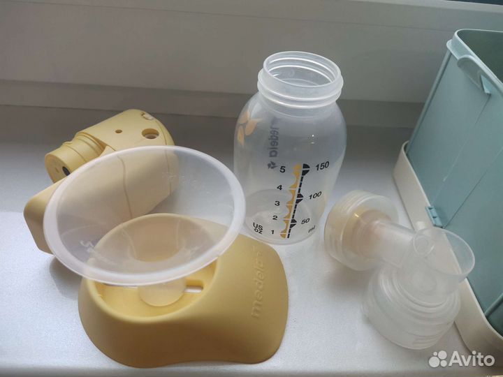 Молокоотсос medela электрический