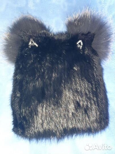 Женские меховые шапки
