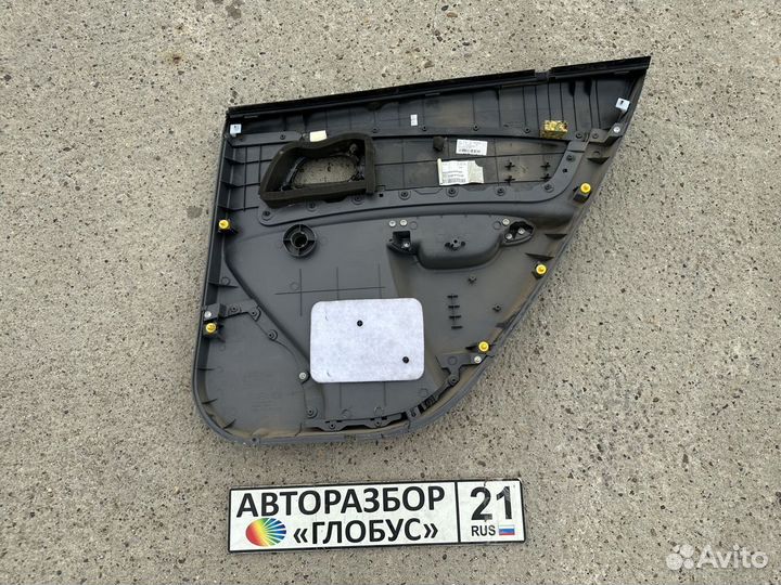Обшивка двери задняя левая Kia Rio 2