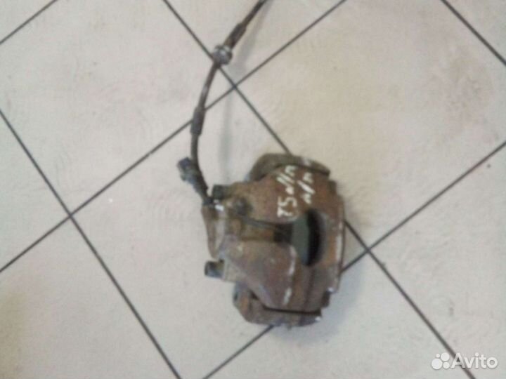 Суппорт тормозной передний левый на т5