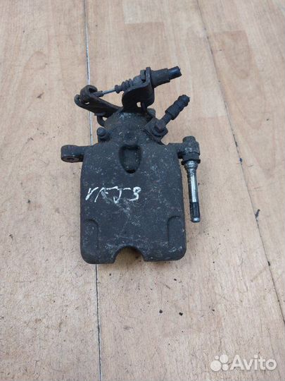 Тормозной суппорт задний левый Opel Insignia