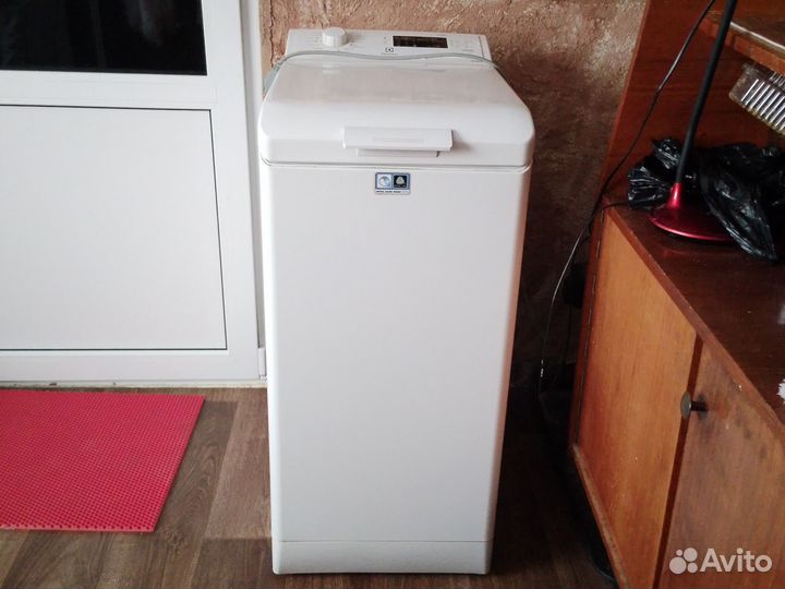 Стиральная машина с вертикальной загрузкой