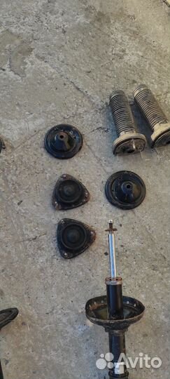 Стойки с пружинами на subaru Forester sg