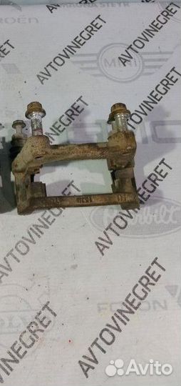 Скоба суппорта заднего Opel Astra H за штуку