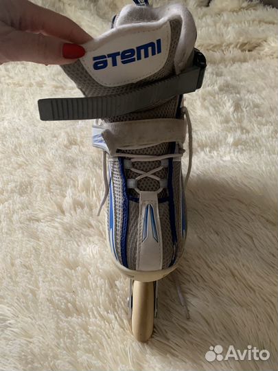 Роликовые коньки