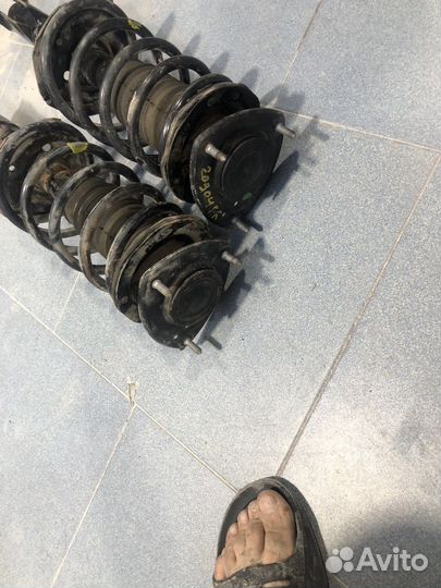 Стойка амортизатора передняя