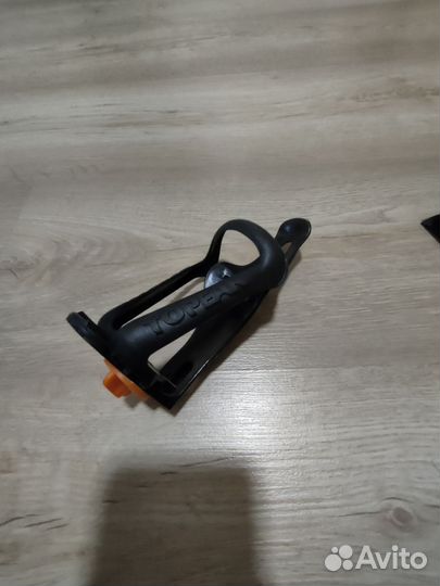 Крепление для бутылки на велосипед