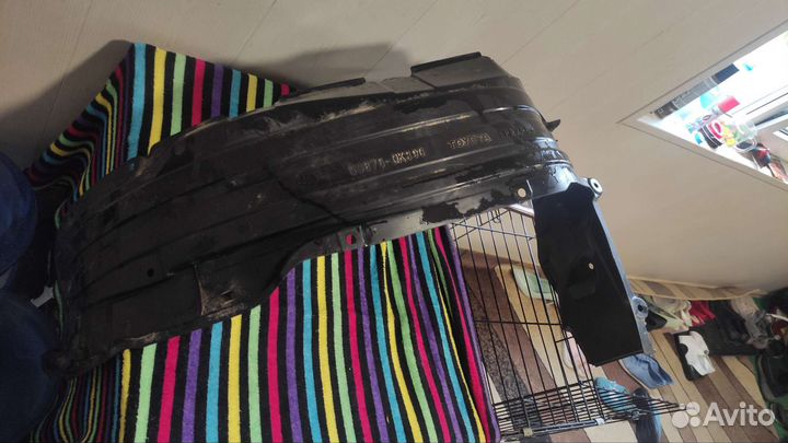 Подкрылок передний левый Toyota Hilux оригинал