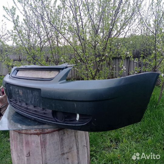 Передний бампер priora