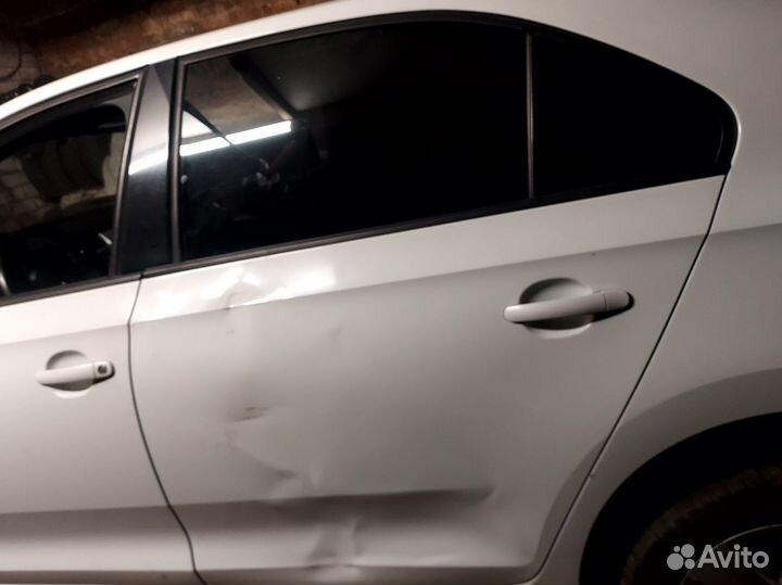 Дверь задняя левая Scoda Rapid