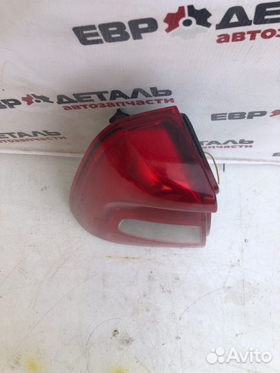 Фонарь задний левый Renault Logan седан 1.4