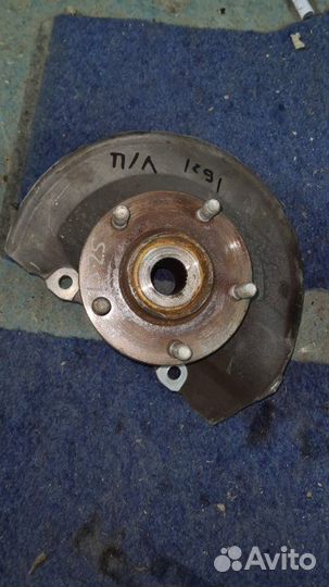 Кулак поворотный передний левый Mitsubishi Lancer