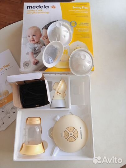 Молокоотсос medela электрический