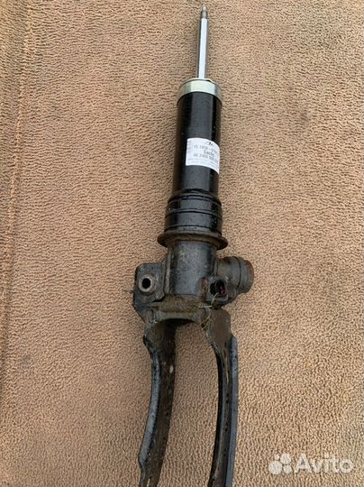 Передний левый амортизатор Порше Кайен 955/957