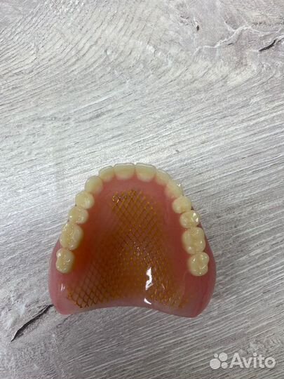 Зубной техник