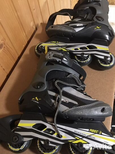 Роликовые коньки