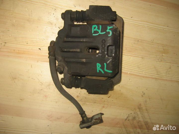 Суппорт зад лево subaru BL5 Legacy/ B4/ Outback '0