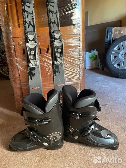 Горные лыжи и ботинки Rossignol