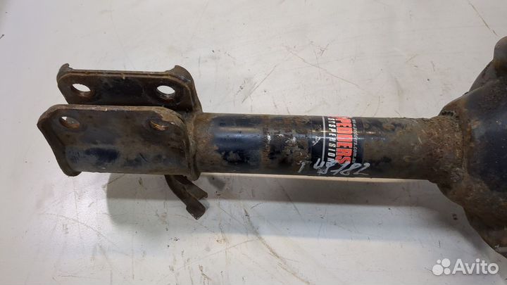 Амортизатор подвески левый задний Subaru Forester (S11)