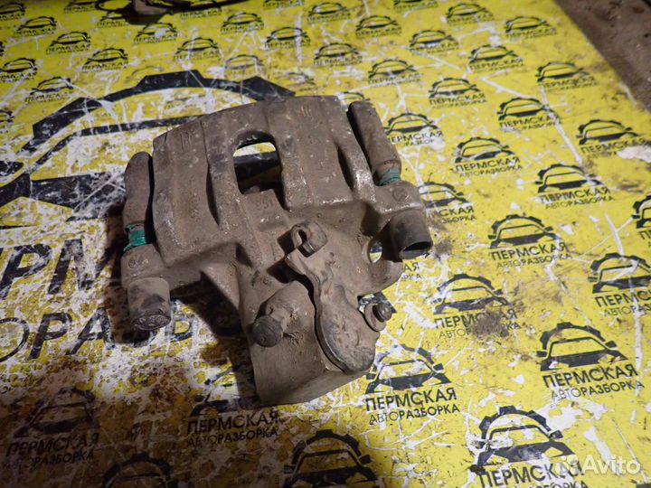 Суппорт тормозной задний левый для Ford Focus II