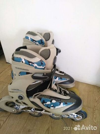 Коньки роликовые