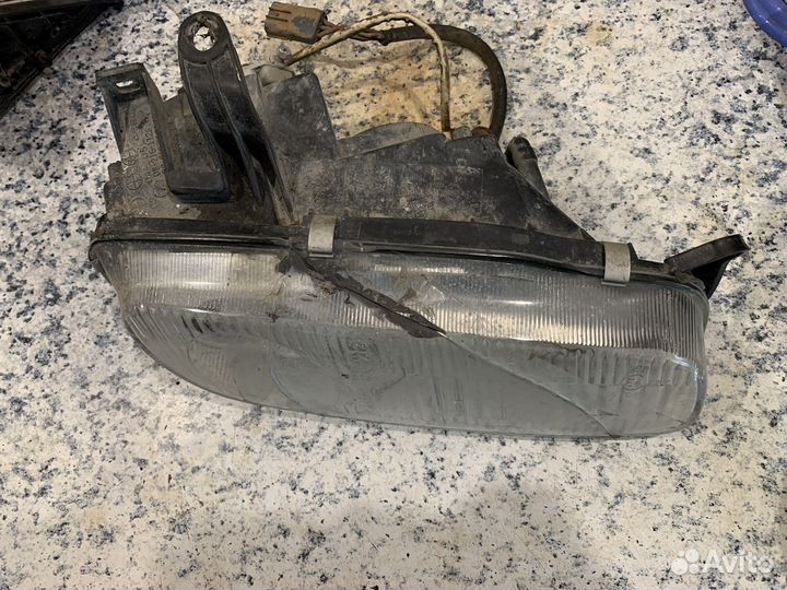Фара правая mazda 323f