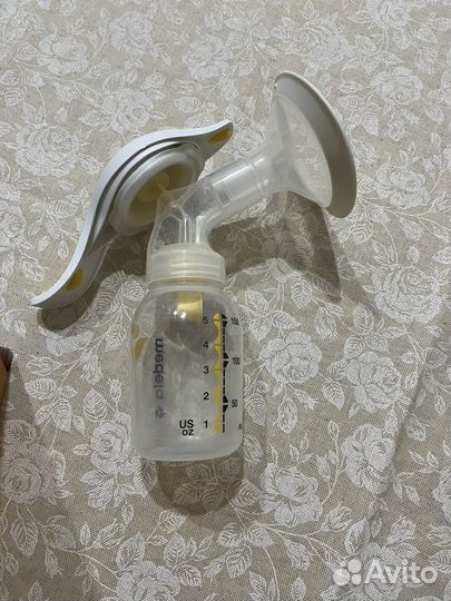 Молокоотсос Medela