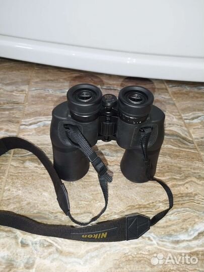 Бинокль nikon aculon a211 10*50