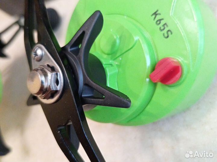 Катушка мультипликаторная зимняя с курком